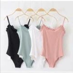 Black ruffle detailed body suit